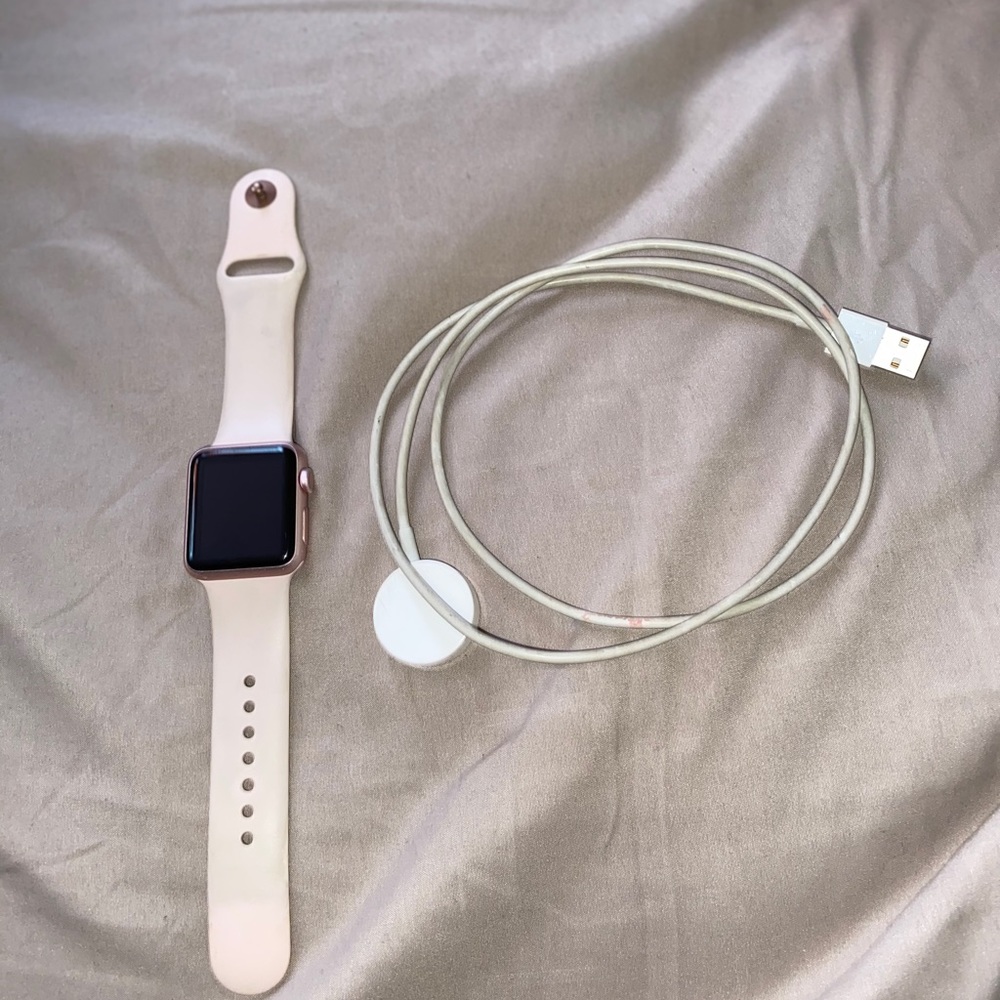 Apple Watch Series 1 38mm comes with charger.